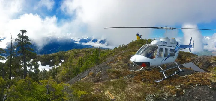 Client receiving personalized helicopter charter quote on tablet