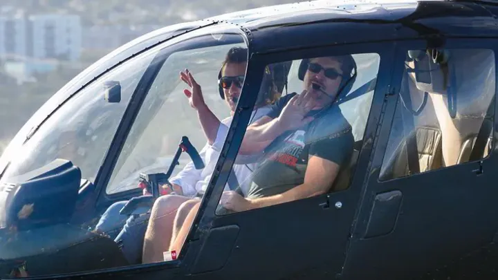 Passenger enjoying smooth helicopter flight with motion sickness prevention tips